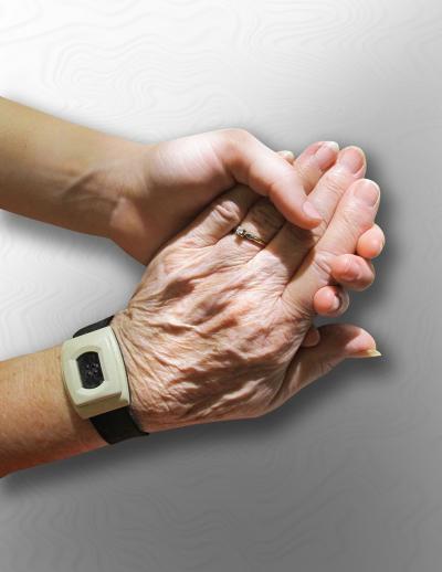 Junge Hand hält alte Hand